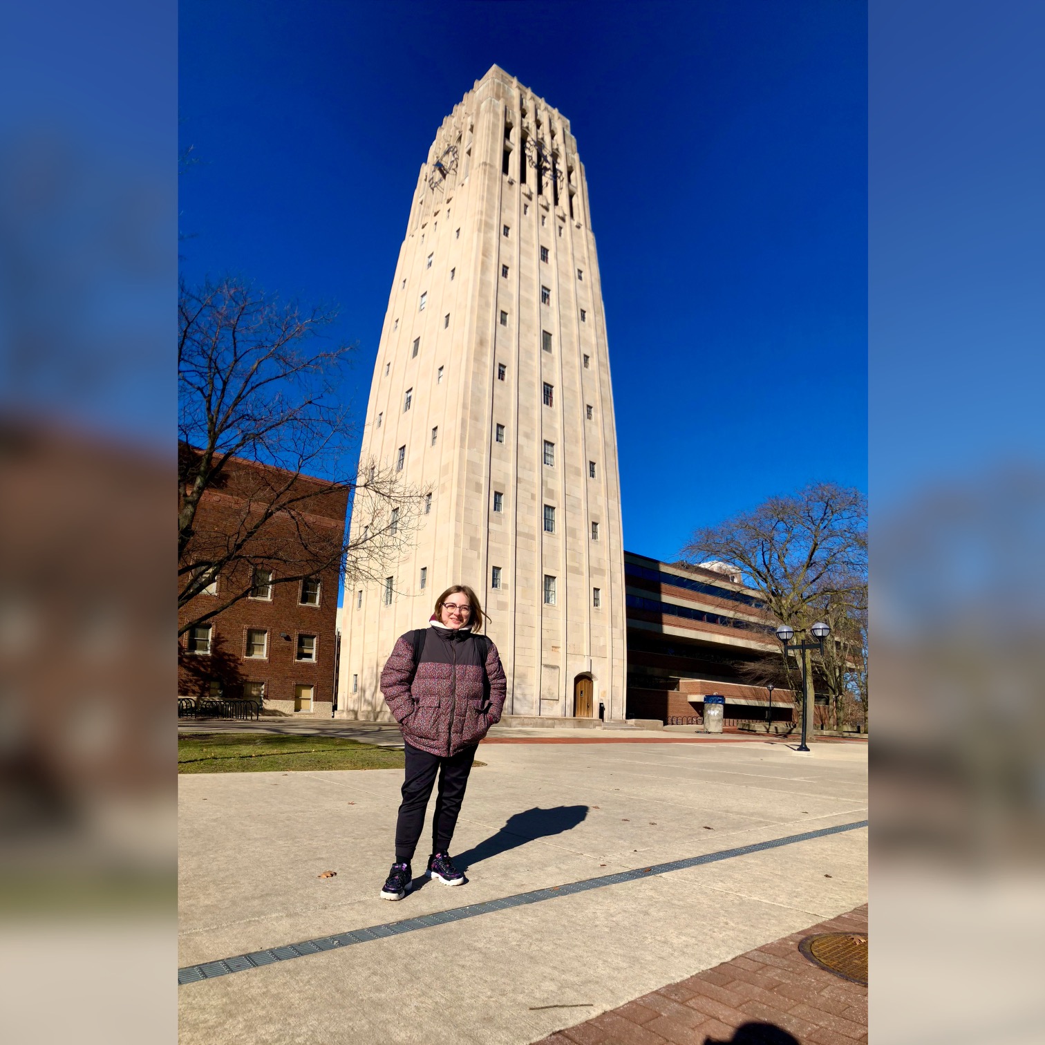 Image of Miranda Cooper standing near Burton Tower